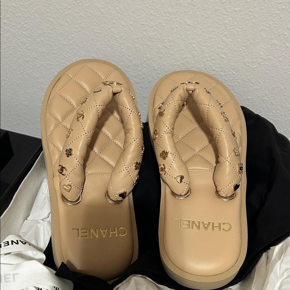 CHANEL Beige Quilted Flip Flops with Gold Accents